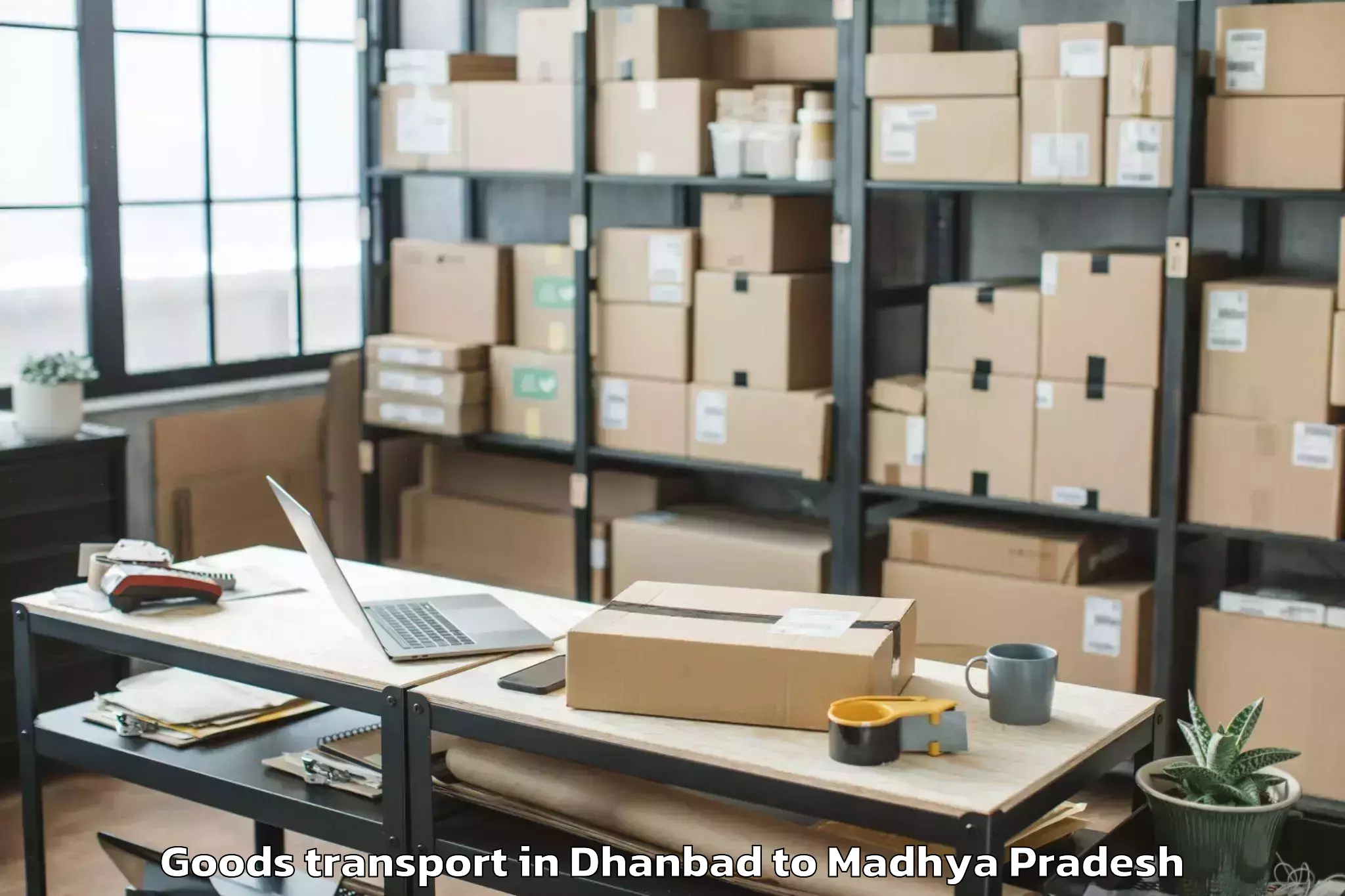 Get Dhanbad to Ghugri Goods Transport